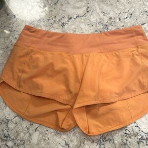 Orange lululemon shorts